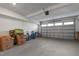 Spacious garage with ample storage space featuring a garage door with windows for natural light at 518 Toran Dr, Wake Forest, NC 27587