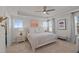 Comfortable main bedroom with tray ceilings, carpeted floors, and natural light at 518 Toran Dr, Wake Forest, NC 27587