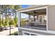Inviting covered porch featuring rocking chairs and a ceiling fan at 518 Toran Dr, Wake Forest, NC 27587