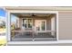 Charming covered porch with rocking chairs, perfect for relaxing outdoors at 518 Toran Dr, Wake Forest, NC 27587