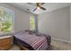 Comfortable bedroom with natural light and serene ambiance at 5301 Northpines Dr, Raleigh, NC 27610