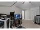 Bonus room with gaming setup, neutral carpeting, and an airy feeling at 5301 Northpines Dr, Raleigh, NC 27610