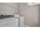 Practical laundry room with a washer and dryer, providing convenience and functionality at 5301 Northpines Dr, Raleigh, NC 27610