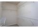 Ample storage space with multiple wire shelves in the walk-in closet, perfect for organization and maximizing space at 7244 Galon Glen Rd, Raleigh, NC 27613
