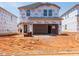 New construction home exterior showcasing Tyvek HomeWrap and brick detail at 828 Ottawa Dr, Garner, NC 27529