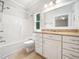 Bathroom featuring granite countertops, tile flooring, and a shower and tub combo at 8312 Bellingham Cir, Raleigh, NC 27615