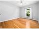A bright bedroom featuring natural light, ceiling fan and neutral paint colors at 8312 Bellingham Cir, Raleigh, NC 27615