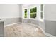 Bright breakfast nook featuring large windows and natural light at 8312 Bellingham Cir, Raleigh, NC 27615