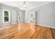 Main bedroom features natural light and an en-suite bathroom at 8312 Bellingham Cir, Raleigh, NC 27615