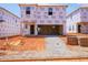 New construction shows the home's exterior framing wrapped in branded weather-resistant material at 832 Ottawa Dr, Garner, NC 27529