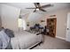 A comfortable bedroom setup with desk, bookshelf, and sports decor, providing a cozy and personalized space at 9200 Lake Carol Dr, Zebulon, NC 27597