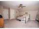 Bright bedroom with a comfortable bed and ample space, featuring neutral tones for a relaxing atmosphere at 9200 Lake Carol Dr, Zebulon, NC 27597