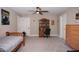 Inviting bedroom with carpet, a ceiling fan, a desk and a bookshelf for a comfortable living space at 9200 Lake Carol Dr, Zebulon, NC 27597