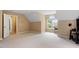 Large bonus room featuring neutral carpet, dormer windows, and ample natural light at 933 Richland Ridge Dr, Wake Forest, NC 27587