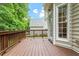 Wooden deck with railings, adjacent to the home's exterior, providing an outdoor living space at 933 Richland Ridge Dr, Wake Forest, NC 27587