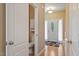 Hallway with a view of the front door and a powder room at 933 Richland Ridge Dr, Wake Forest, NC 27587