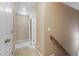 Neutral hallway leading to bedrooms, with carpet and natural lighting at 933 Richland Ridge Dr, Wake Forest, NC 27587
