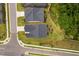 Aerial view of the house showing the roof, yard, and surrounding neighborhood at 1002 Gilly Ct, Durham, NC 27703