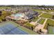 A high-angle view of the clubhouse, pool, tennis courts, and more at 1002 Gilly Ct, Durham, NC 27703