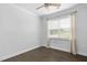 Bedroom with large window and hardwood floors at 1002 Gilly Ct, Durham, NC 27703