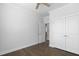 Bedroom with large closet, hardwood floors, and light gray walls at 1002 Gilly Ct, Durham, NC 27703