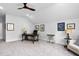 Bonus room includes dark wood desk, ceiling fan, carpet, and neutral paint at 1002 Gilly Ct, Durham, NC 27703