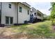 Backyard with a screened porch, french doors and ample space for outdoor activities at 1003 E Sterlington Pl, Apex, NC 27502