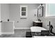 Stylish bathroom showcasing a soaking tub and vanity area with modern fixtures at 1003 E Sterlington Pl, Apex, NC 27502