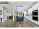 Modern open floor plan with a large island and lots of natural light, perfect for entertaining at 1003 E Sterlington Pl, Apex, NC 27502