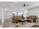 Bright open floor plan with hardwood floors, kitchen and living room at 1003 E Sterlington Pl, Apex, NC 27502