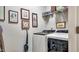 Convenient laundry room with modern appliances and ample storage space for household needs at 1012 Autumn Meadow Ln, Wake Forest, NC 27587