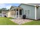 Outdoor screened porch with patio, providing an ideal spot for grilling and enjoying the outdoors at 1012 Autumn Meadow Ln, Wake Forest, NC 27587