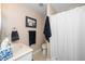 Functional bathroom with a tub and shower combination and neutral tones at 1015 Manchester Dr, Cary, NC 27511