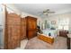 Bright bedroom with a ceiling fan, ample storage, and natural light from the window at 1015 Manchester Dr, Cary, NC 27511
