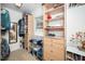 Organized closet with built-in shelving and storage solutions for clothing and accessories at 1015 Manchester Dr, Cary, NC 27511