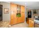 Kitchen with ample maple cabinets, granite countertops, and decorative accents at 1015 Manchester Dr, Cary, NC 27511