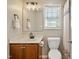 Bathroom features modern fixtures, excellent lighting, and wood cabinets at 105 Tactical Dr, Bunnlevel, NC 28323
