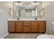 Bathroom with a double sink vanity, modern fixtures, and excellent lighting at 105 Tactical Dr, Bunnlevel, NC 28323