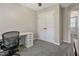 Bedroom featuring modern desk, soft carpet, neutral paint, a ceiling fan, and natural light at 105 Tactical Dr, Bunnlevel, NC 28323