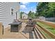 Wooden deck featuring an outdoor seating area, and grill, perfect for entertaining at 105 Tactical Dr, Bunnlevel, NC 28323