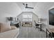 Spacious home office with 2 work stations, modern ceiling fan and ample storage at 105 Tactical Dr, Bunnlevel, NC 28323