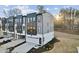 Beautiful exterior of this two-story townhome with a modern color scheme, garage, and landscaped yard at 10518 Pleasant Branch Dr # 38, Raleigh, NC 27614