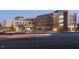 Image of a multi-story hospital building at dusk with illuminated windows and parking area at 10518 Pleasant Branch Dr # 38, Raleigh, NC 27614