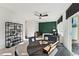Inviting open-concept living room with a sleek ceiling fan, stylish decor, and a view to the exterior at 10518 Pleasant Branch Dr # 38, Raleigh, NC 27614
