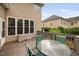 Back porch with a patio set overlooking the landscaped backyard at 111 Gingergate Dr, Cary, NC 27519