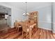 Cozy dining room featuring hardwood floors, a chandelier, and a wooden china cabinet at 111 Gingergate Dr, Cary, NC 27519