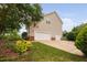 Spacious two-car garage with well-maintained landscaping at 111 Gingergate Dr, Cary, NC 27519