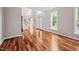 Spacious living room with gleaming hardwood floors and a grand entrance at 111 Gingergate Dr, Cary, NC 27519