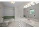Bathroom with white tile and marble countertop, sink, toilet, bathtub and shower at 12088 Burlington Rd, Hurdle Mills, NC 27541