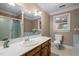Bathroom with shower, bathtub, sink and toilet at 12088 Burlington Rd, Hurdle Mills, NC 27541